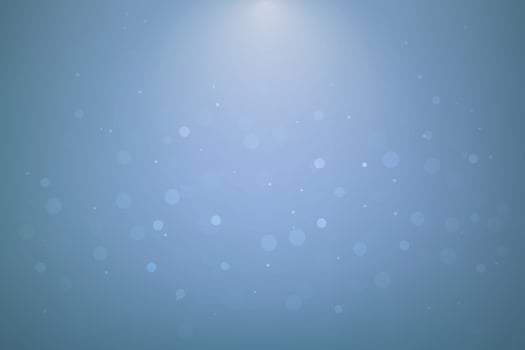 Light blue background with floating soft bokeh light dots vector