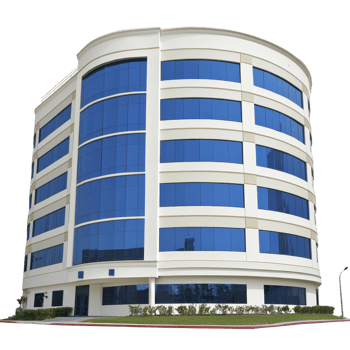 modern, five story office building with sleek, curved design features large blue tinted windows and white facade. structure is surrounded by neatly trimmed shrubs, creating professional appearance png