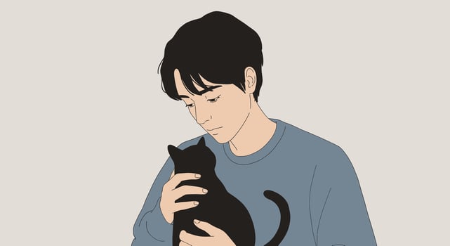 A man holding a black cat in his arms vector