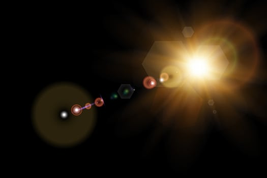 An illustration of a star with a bright light vector