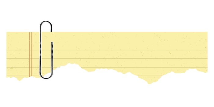Vintage torn yellow paper ,with paper clip with jagged, rough borders. Retro grunge style vector
