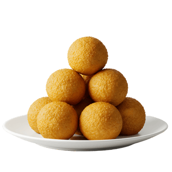 Golden Round Sweet Balls Stacked on White Plate png