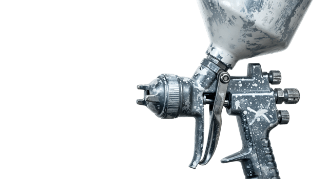 Close-Up of a Grey and White Paint Sprayer on a Black Background png