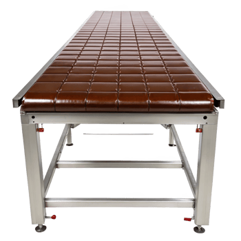 Chocolate enrobing belt table isolated on transparent background png
