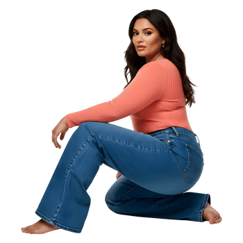 Confident Plus Size Woman in Stylish Coral Knit Top and Denim Jeans png