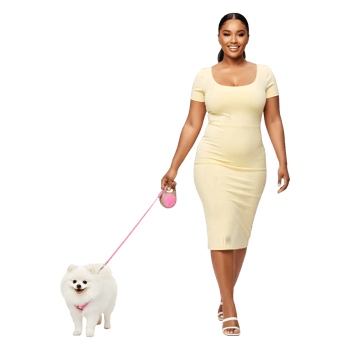 Confident Woman Strolling with Her Adorable Pomeranian Dog png