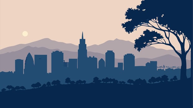 City Skyline Silhouette at Dusk with Mountains and Tree vector