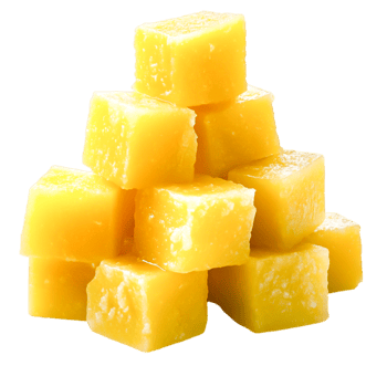 Bright Yellow Cubes of Fresh Mango Dessert Stacked for Refreshing Summer Delight png