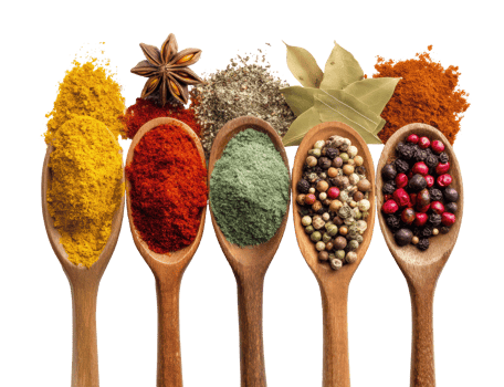Colorful assortment of spices in wooden spoons for culinary use png