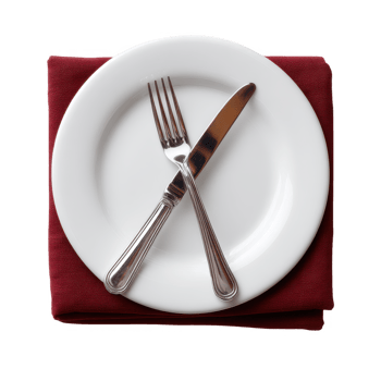 A clean white plate with a fork and knife crossed on a burgundy napkin, elegantly arranged for dining. png
