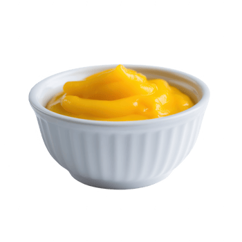A white dish filled with creamy yellow sauce, showcasing a rich texture, perfect for enhancing various dishes or servings. png