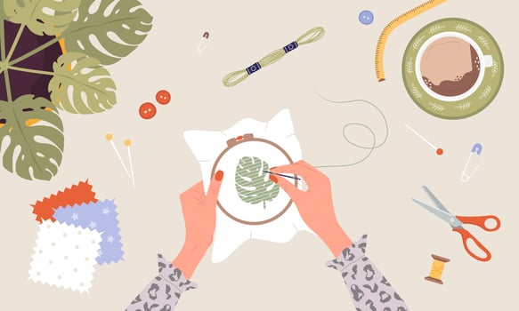 Embroidery process. Workshop, needlework and knitting. Female hands with needle and thread. Top view of the workplace. Tailor shop elements. Hand drawn illustration in flat style vector