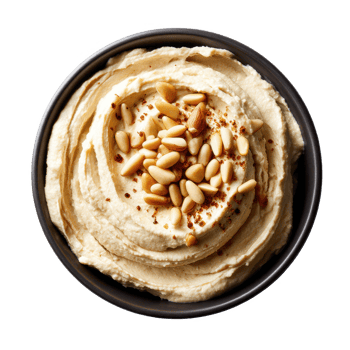 Delicious hummus dip with pine nuts in bowl healthy food concept on transparent background png