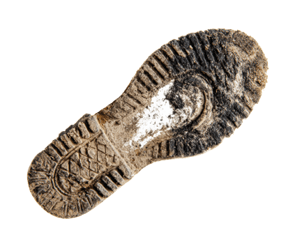 Dirty shoe sole showing wear and tear from outdoor activities png