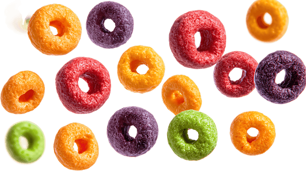 Colorful Cereal Pieces on Transparent Background Fruity Circles Isolated Delicious Breakfast Treats png