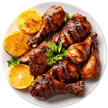 Juicy Grilled Chicken Drumsticks Served with Fresh Lemnd Green Herbs png