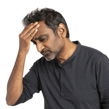 A man holding his head in his hands png