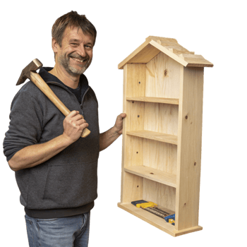 A man holding a hammer and a wooden shelf png