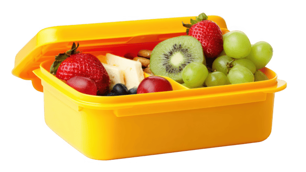 Yellow lunchbox filled with fresh fruits and nuts on transparent background png