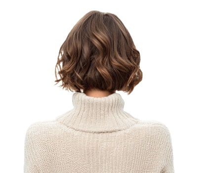 Chic winter bob hairstyle with a cozy sweater png