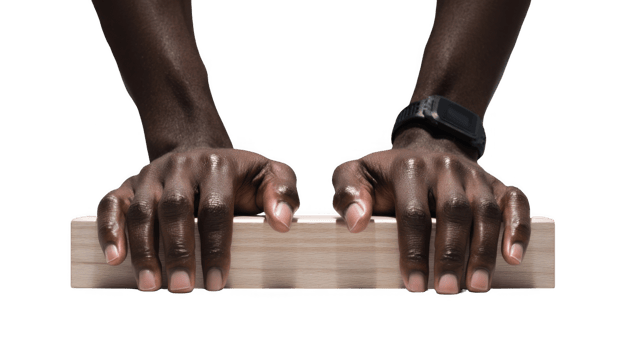 Athlete gripping starting block, ready for competition png