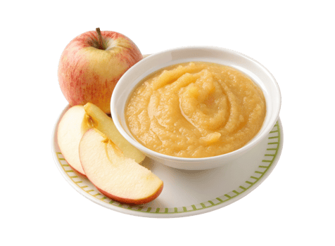 A plate of baby apple puree with apple slice isolated on a transparent background png