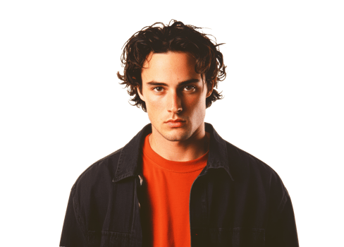 Young man with curly hair in casual outfit expressing serious emotions png