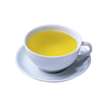 White ceramic cup filled with vibrant yellow tea sits on matching saucer, creating calming and inviting scene. smooth surface of cup enhances warm, soothing appearance of tea png