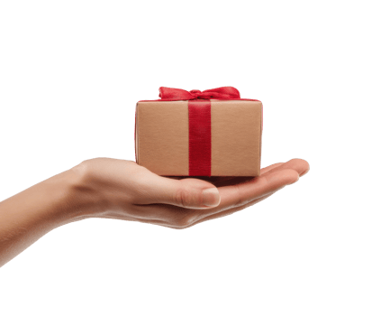 Hand holding a gift box with red ribbon for celebration event png