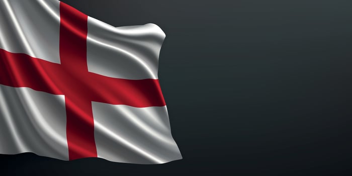 England national flag waving on dark background vector