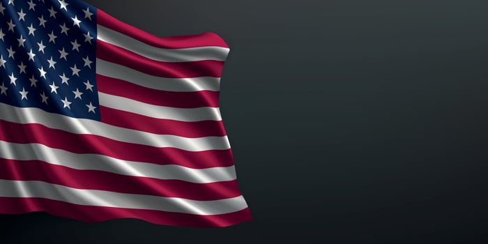 United States national flag waving on dark background vector