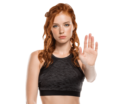 Woman in activewear stopping gesture for fitness awareness png