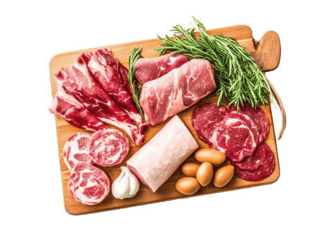 Fresh cuts of meat and ingredients displayed on a wooden board png