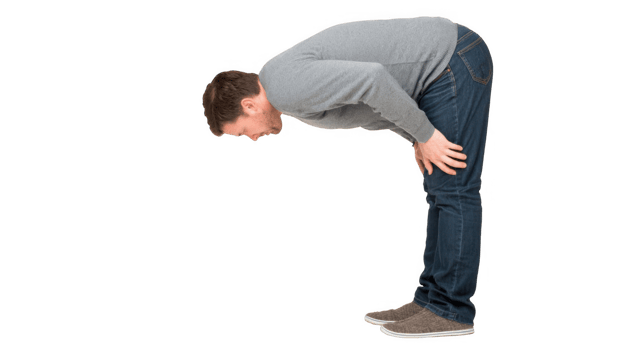 Man bending over holding his knees in pain on transparent background png