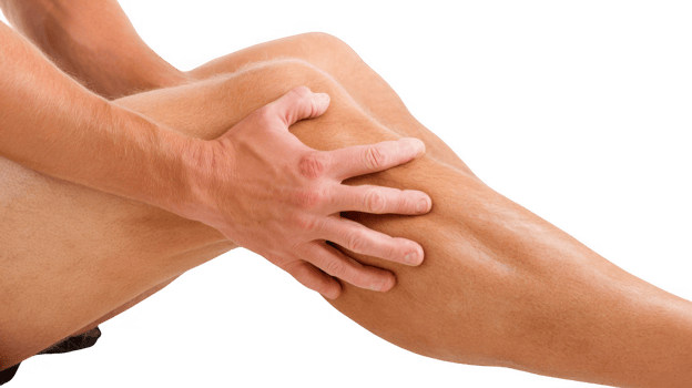 Athlete massaging leg muscle on transparent background png