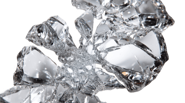 Shattered glass shards glimmering on transparent background png