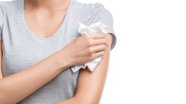Woman holding gauze on arm after vaccine injection with transparent background png