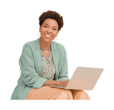 Smiling african female adult working on laptop in casual attire png