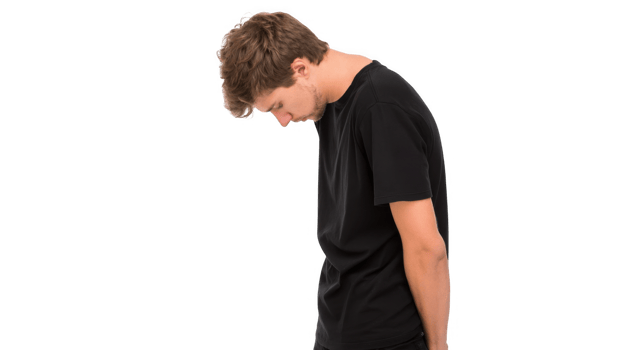 Young man hanging head low with bad posture on transparent background png