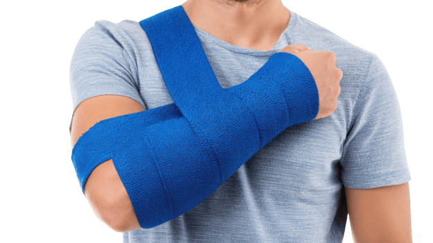 Man wearing blue arm sling touching his shoulder on transparent background png
