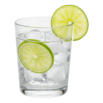 Clear Carbonated Beverage with Lime Slices and Ice in a Rocks Glass. Cut Out, Clipping Path on Transparent Background. png