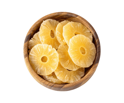 Dried and dehydrated pineapple slices in a wooden bowl isolated on a transparent background top view png