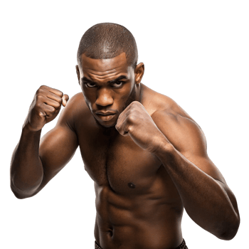 Muscular black male boxer in fighting stance studio portrait png