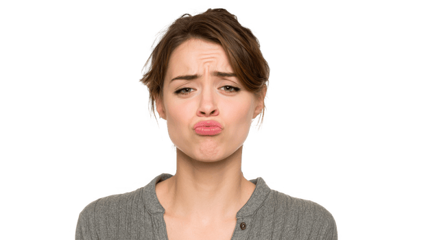 Young woman showing sadness with pouty lips on transparent background png