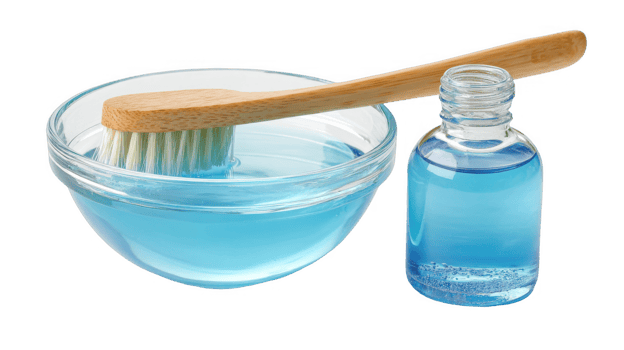 Disinfecting brush soaking in blue cleaning solution with transparent background png