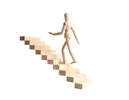 A wooden man walking up a set of stairs png