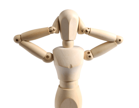 A wooden mannequin with its hands on its head png