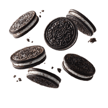 Floating Chocolate Sandwich Cookies with Cream Filling on Transparent Background Delicious png