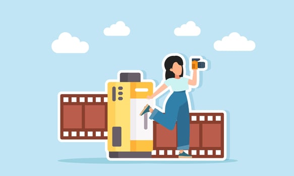 Woman holding camera near film rolls vector