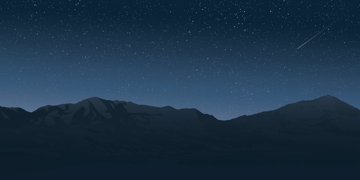 Night sky with stars over mountains vector